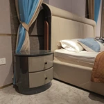 High-Gloss Round Nightstand with Grey Diagonal Pattern and Curved Cream Drawers